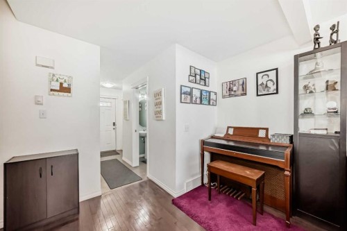65 Spring Meadows Bay, Okotoks, AB - Indoor Photo Showing Other Room