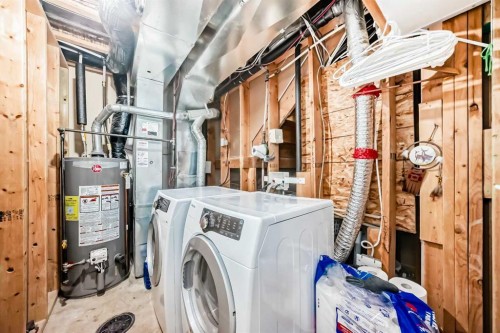 65 Spring Meadows Bay, Okotoks, AB - Indoor Photo Showing Laundry Room