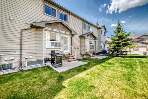 65 Spring Meadows Bay, Okotoks, AB - Outdoor
