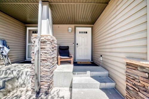 65 Spring Meadows Bay, Okotoks, AB - Outdoor With Exterior
