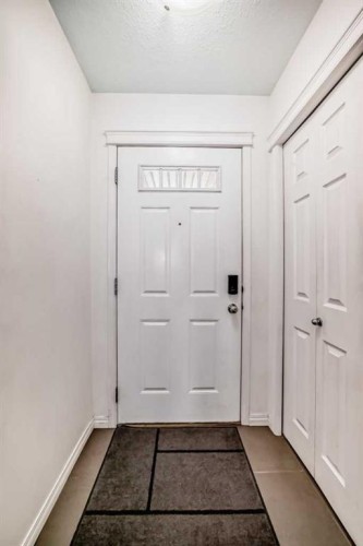 65 Spring Meadows Bay, Okotoks, AB - Indoor Photo Showing Other Room
