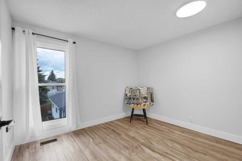 22 Sandstone Crescent Se, Airdrie, AB - Indoor Photo Showing Other Room