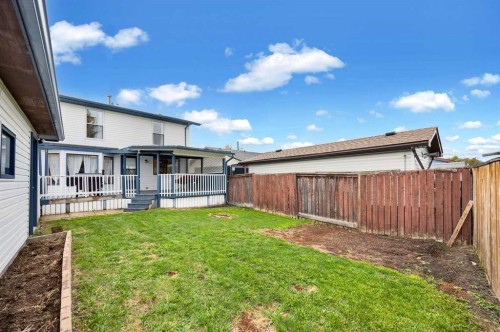 22 Sandstone Crescent Se, Airdrie, AB - Outdoor With Deck Patio Veranda