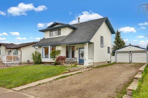 22 Sandstone Crescent Se, Airdrie, AB - Outdoor With Deck Patio Veranda