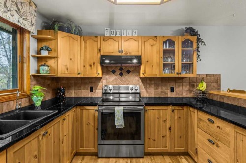 146 Cougar Point Road, Canmore, AB - Indoor Photo Showing Kitchen With Double Sink