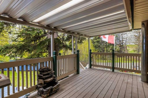 146 Cougar Point Road, Canmore, AB - Outdoor With Deck Patio Veranda With Exterior