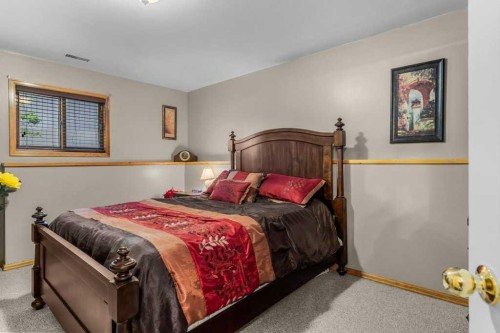 146 Cougar Point Road, Canmore, AB - Indoor Photo Showing Bedroom
