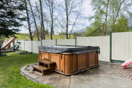 146 Cougar Point Road, Canmore, AB - Outdoor With Deck Patio Veranda