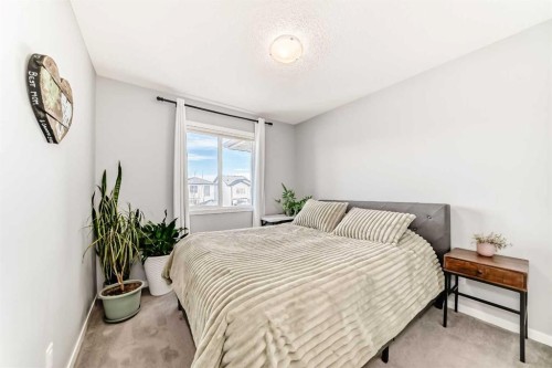 196 Dawson Drive, Chestermere, AB - Indoor Photo Showing Bedroom