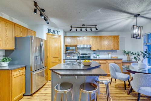 268 Mt Brewster Circle Se, Calgary, AB - Indoor Photo Showing Kitchen With Double Sink