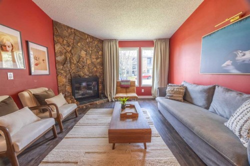 6716 Ranchview Drive Nw, Calgary, AB - Indoor Photo Showing Living Room With Fireplace