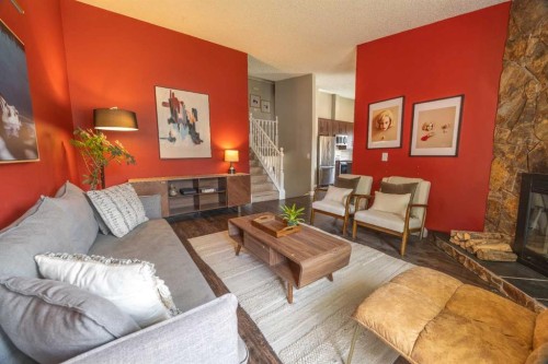 6716 Ranchview Drive Nw, Calgary, AB - Indoor Photo Showing Living Room With Fireplace