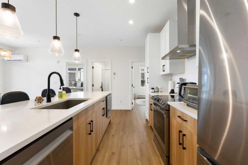 6103-200 Seton Circle Se, Calgary, AB - Indoor Photo Showing Kitchen With Stainless Steel Kitchen With Upgraded Kitchen