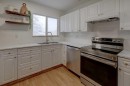 10-707 Westmount Drive, Strathmore, AB  - Indoor Photo Showing Kitchen With Double Sink 