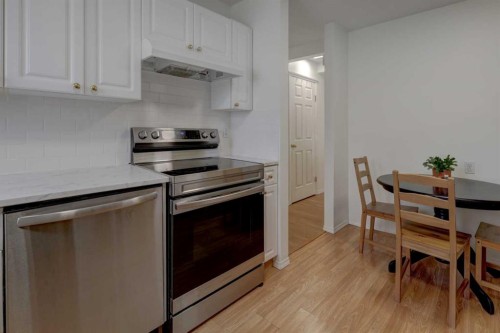 10-707 Westmount Drive, Strathmore, AB - Indoor Photo Showing Kitchen