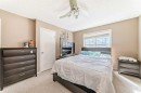 80 Elgin Gardens Se, Calgary, AB  - Indoor Photo Showing Bedroom 