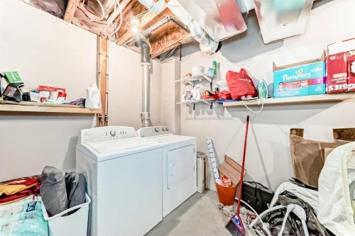80 Elgin Gardens Se, Calgary, AB - Indoor Photo Showing Laundry Room