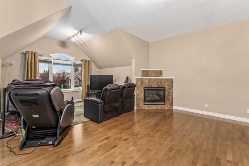 1733 Evergreen Drive Sw, Calgary, AB - Indoor With Fireplace