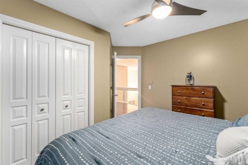 1733 Evergreen Drive Sw, Calgary, AB - Indoor Photo Showing Bedroom