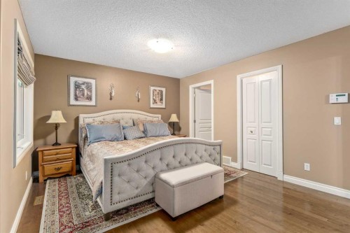 1733 Evergreen Drive Sw, Calgary, AB - Indoor Photo Showing Bedroom