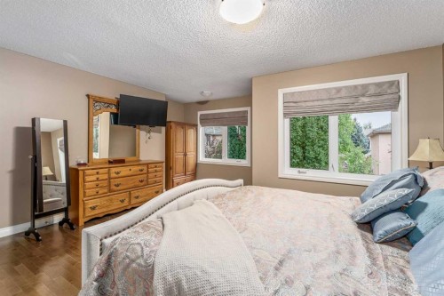 1733 Evergreen Drive Sw, Calgary, AB - Indoor Photo Showing Bedroom