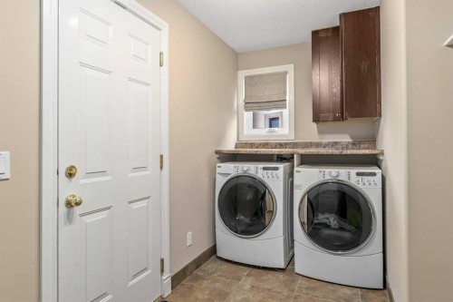 1733 Evergreen Drive Sw, Calgary, AB - Indoor Photo Showing Laundry Room