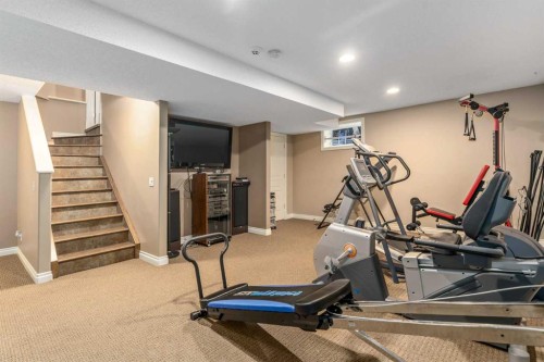 1733 Evergreen Drive Sw, Calgary, AB - Indoor Photo Showing Gym Room