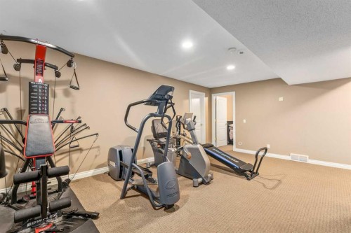 1733 Evergreen Drive Sw, Calgary, AB - Indoor Photo Showing Gym Room