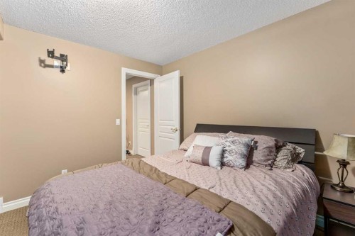 1733 Evergreen Drive Sw, Calgary, AB - Indoor Photo Showing Bedroom