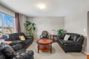 83 Saddlebrook Gardens Ne, Calgary, AB  - Indoor Photo Showing Living Room 
