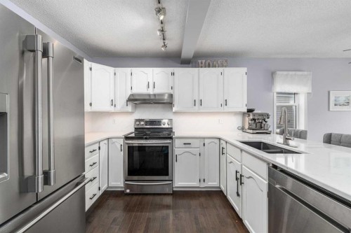 381 Hidden Valley Manor Nw, Calgary, AB - Indoor Photo Showing Kitchen With Stainless Steel Kitchen With Double Sink