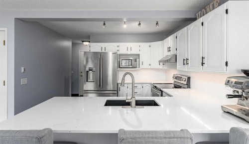 381 Hidden Valley Manor Nw, Calgary, AB - Indoor Photo Showing Kitchen With Stainless Steel Kitchen With Upgraded Kitchen