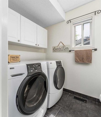 381 Hidden Valley Manor Nw, Calgary, AB - Indoor Photo Showing Laundry Room