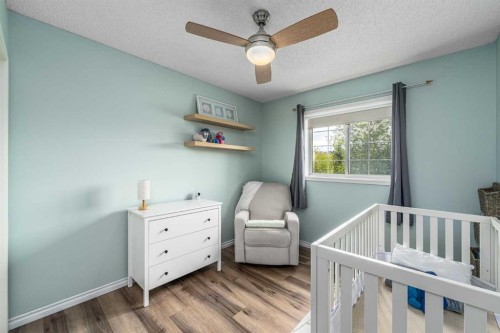 381 Hidden Valley Manor Nw, Calgary, AB - Indoor Photo Showing Bedroom