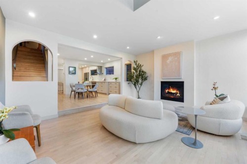 2531 7 Avenue Nw, Calgary, AB - Indoor Photo Showing Living Room With Fireplace
