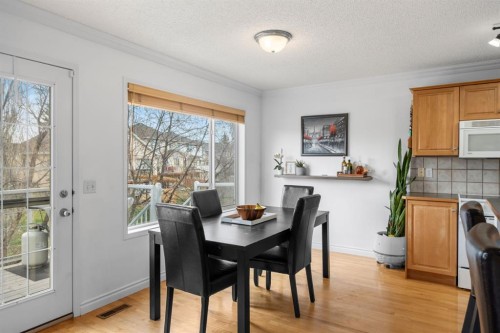 26 Somerset Crescent Sw, Calgary, AB - Indoor Photo Showing Dining Room