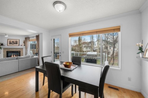26 Somerset Crescent Sw, Calgary, AB - Indoor With Fireplace