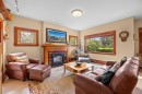236 10 Avenue Ne, Calgary, AB  - Indoor Photo Showing Living Room With Fireplace 