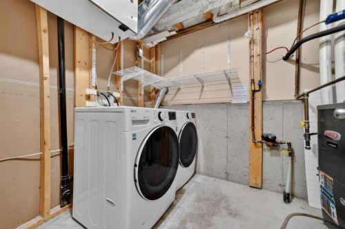 801 Mt Sundance Lane West, Lethbridge, AB - Indoor Photo Showing Laundry Room
