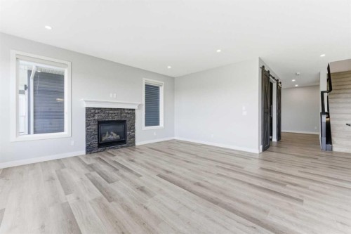 40 Evansfield Manor Nw, Calgary, AB - Indoor Photo Showing Living Room With Fireplace