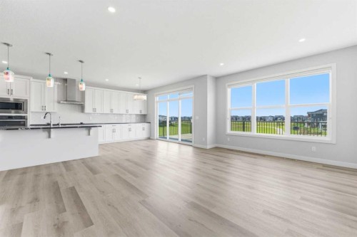 40 Evansfield Manor Nw, Calgary, AB - Indoor Photo Showing Kitchen With Fireplace