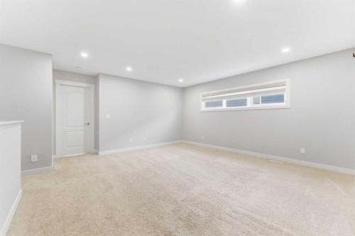 40 Evansfield Manor Nw, Calgary, AB - Indoor Photo Showing Other Room