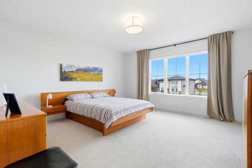 24 Monterra Landing, Cochrane Lake, AB - Indoor Photo Showing Bedroom