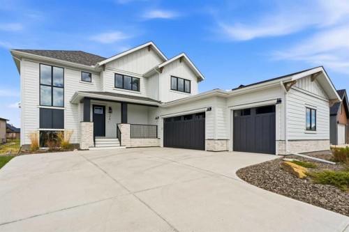 24 Monterra Landing, Cochrane Lake, AB - Outdoor With Facade