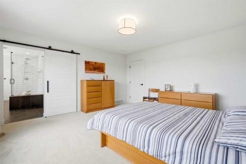 24 Monterra Landing, Cochrane Lake, AB - Indoor Photo Showing Bedroom