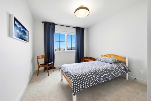 24 Monterra Landing, Cochrane Lake, AB - Indoor Photo Showing Bedroom