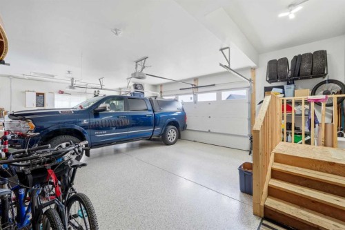 24 Monterra Landing, Cochrane Lake, AB - Indoor Photo Showing Garage