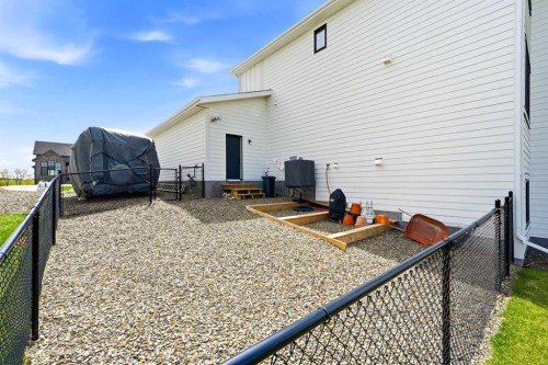 24 Monterra Landing, Cochrane Lake, AB - Outdoor With Exterior