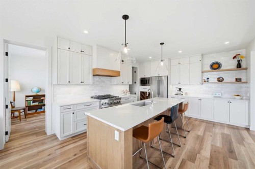 24 Monterra Landing, Cochrane Lake, AB - Indoor Photo Showing Kitchen With Stainless Steel Kitchen With Upgraded Kitchen
