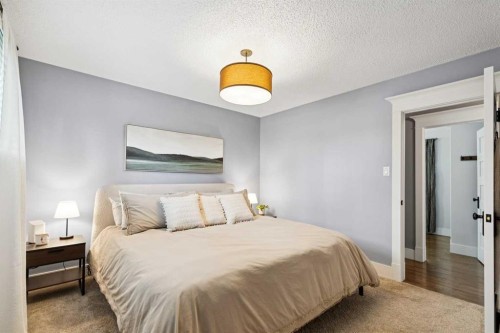 162 Fyffe Road Se, Calgary, AB - Indoor Photo Showing Bedroom